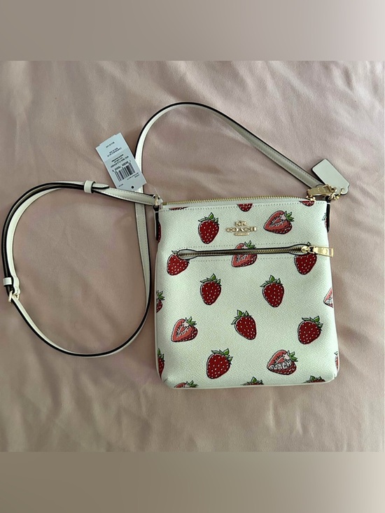 Coach Handbags - Coach Cream Crossbody Bag with Red Strawberry Print